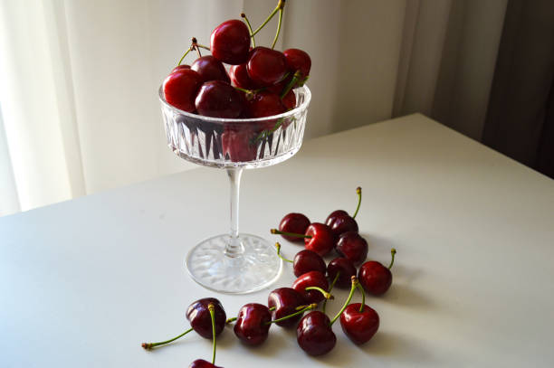 istock Fresh Cherries in Crystal Glass 2159132511