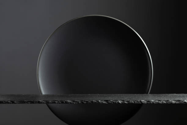 istock Black stone podium and black circle ceramic plate for luxury product placement. 2159133213