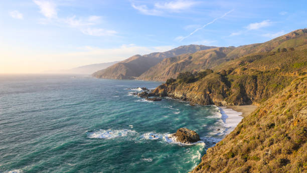 istock Big Sur, California, landscape, coastal, breathtaking, scenery, sunsets, sunrises, cliffs, Pacific Ocean, rugged, coastline, panoramic, views, serene, beauty, natural, wonder, golden hour, twilight, horizon, sea, waves, crashing, shore, dramatic 2159134203