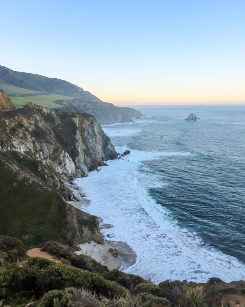 istock Big Sur, California, landscape, coastal, breathtaking, scenery, sunsets, sunrises, cliffs, Pacific Ocean, rugged, coastline, panoramic, views, serene, beauty, natural, wonder, golden hour, twilight, horizon, sea, waves, crashing, shore, dramatic 2159134316