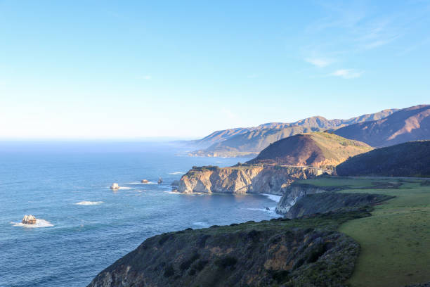 istock Big Sur, California, landscape, coastal, breathtaking, scenery, sunsets, sunrises, cliffs, Pacific Ocean, rugged, coastline, panoramic, views, serene, beauty, natural, wonder, golden hour, twilight, horizon, sea, waves, crashing, shore, dramatic 2159134859