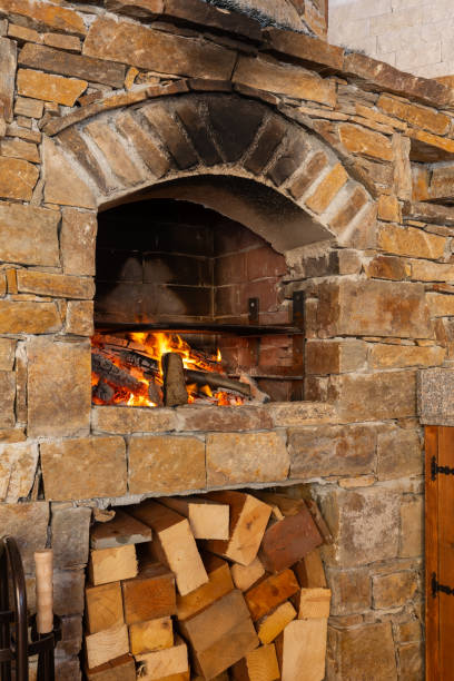 istock Oven with burning firewood for barbeque 2159135115
