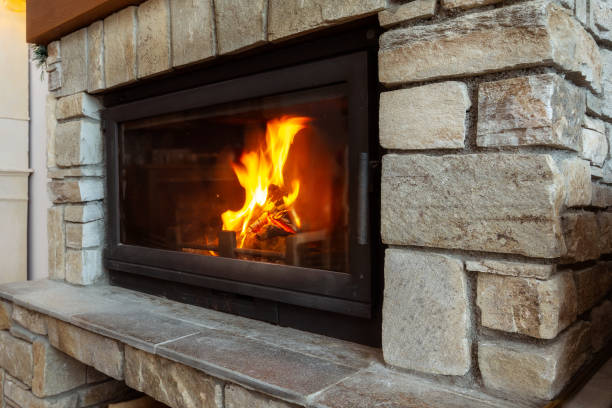 istock Stone Fireplace with burning fire, Cozy Winter 2159135116