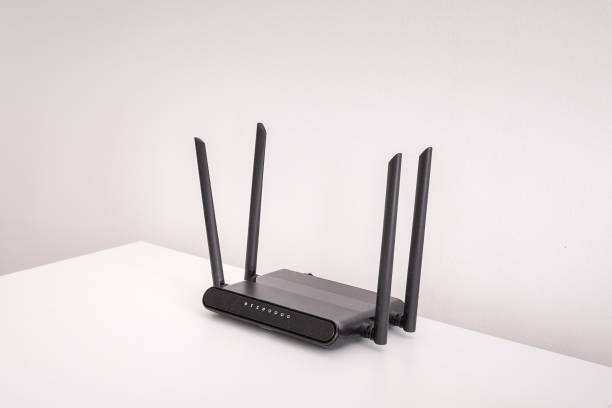 istock black wifi router on white table indoors 2159135211