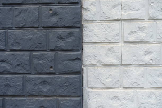Texture of black and white concrete brick veneer wall