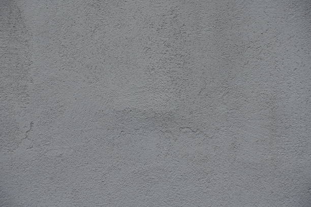 istock Surface of gray wall with coarse roughcast finish 2159136999