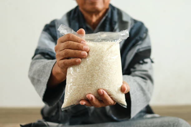 Muslim Man Showing Rice For Giving To People Need Zakat