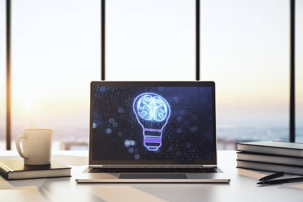 istock Creative light bulb with human brain hologram on modern laptop monitor, artificial Intelligence and neural networks concept. 3D Rendering 2159138093
