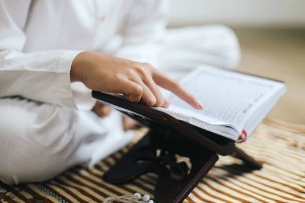 istock Boy, recite the quran 2159138944