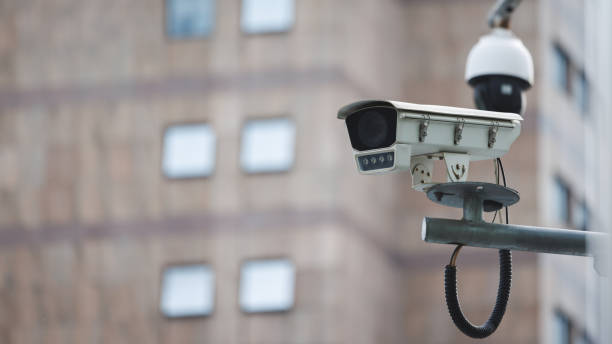 istock A CCTV surveillance security camera is mounted on a pole in front of a building inside city for public safety and monitoring. 2159141993