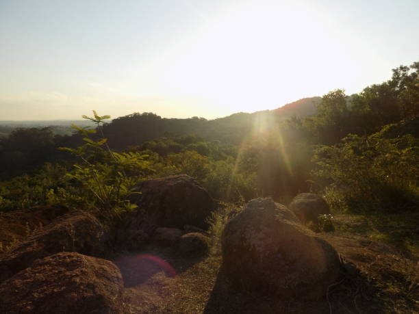 Sun setting behind the rocky mountains of the Atlantic Forest