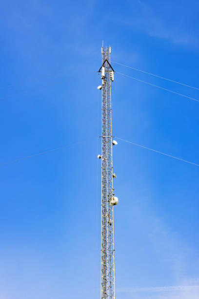 istock Radio mast with antennas at a clearless blue sky 2159147674