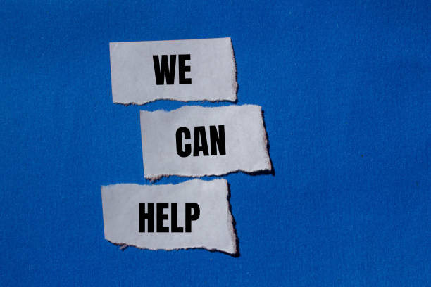 istock We can help message written on ripped paper pieces with blue background 2159153153