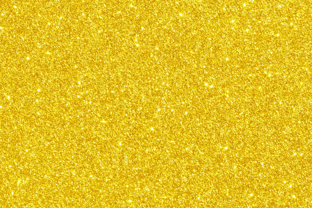 istock Golden yellow glitter light shiny texture background. 2159154257