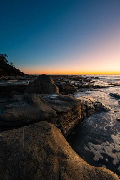 istock Dawn at rocky coastline 2159161805