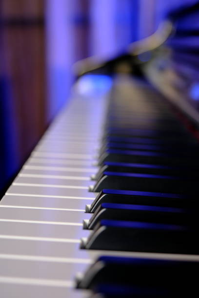 istock Piano keys close-up. Selective focus. Music and entertainment concept. 2159162366