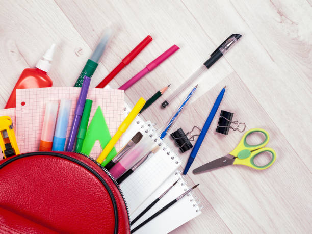 istock Stationery for studying against the background of a student's backpack 2159163043
