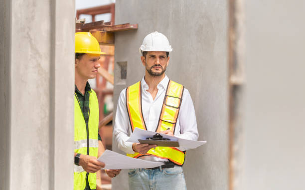 istock Engineer and foreman worker team inspect the construction site, Site manager and builder on construction site 2159163494