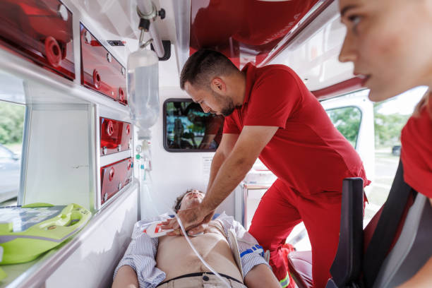 istock Paramedics performing CPR on a patient inside an ambulance 2159164011