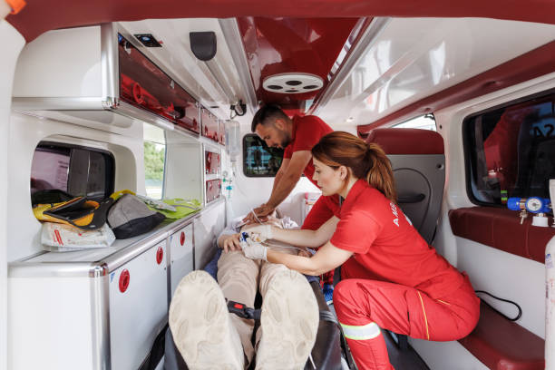 istock Paramedics providing emergency medical care inside an ambulance 2159164014