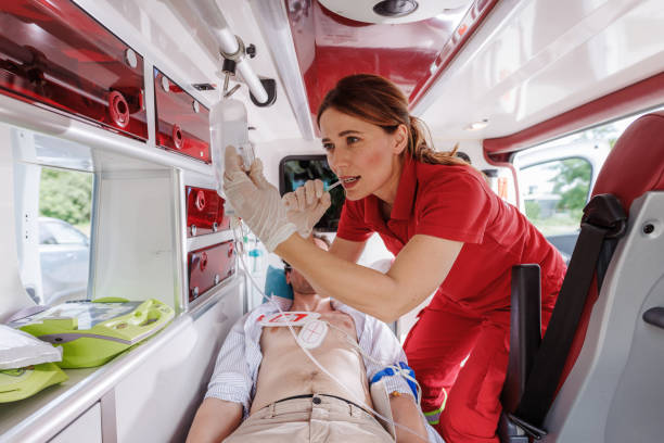 istock Emergency medical professional in ambulance caring for patient 2159164094