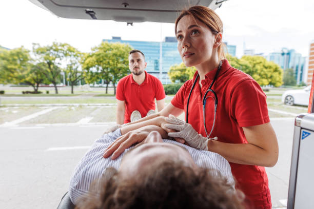 istock Emergency workers transporting a patient to hospital 2159164193