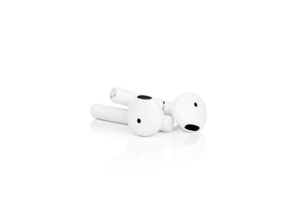 istock White headphones wireless earphones isolated on white with clipping path 2159165830