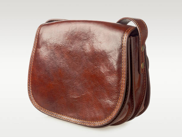 istock Women's handmade leather bag isolated on a white background 2159168182