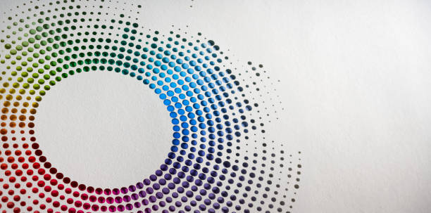 istock Intricate Circular Cut Paper Artwork Featuring Gradient of Colors in Dotted Pattern Against White Background 2159170693