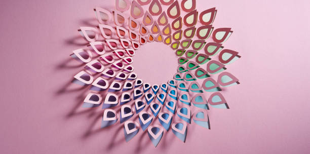 istock Vibrant Multicolored Paper Cutout Flower Artwork Displayed in a Mesmerizing Spiral Design 2159170756