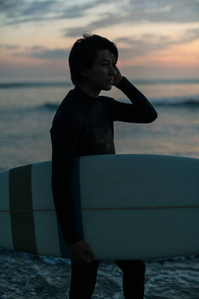 istock Man surfing in the morning ocean. 2159175823
