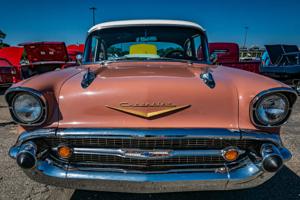1957 Chevrolet Bel Air 2 Door Sedan Gulfport, MS - October 01, 2023: High perspective front view of a 1957 Chevrolet Bel Air 2 Door Sedan at a local car show. 1950s chevy sedan stock pictures, royalty-free photos & images