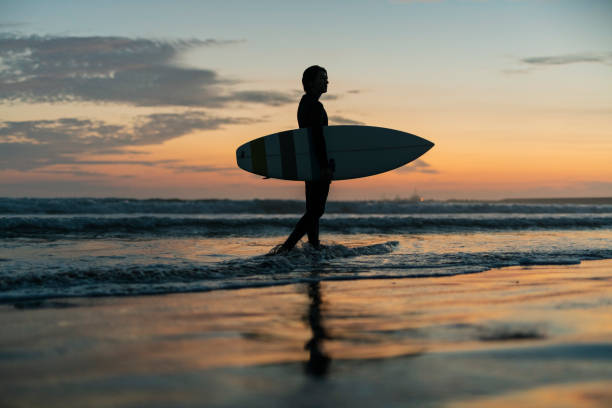 istock Man surfing in the morning ocean. 2159176465
