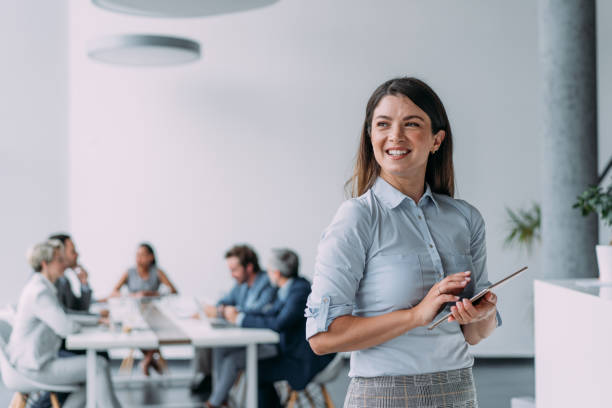 istock Successful businesswoman in the office. 2159178371