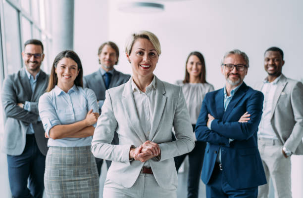 istock Confident businesswoman and her team. 2159178390