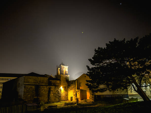 istock Historic Church and Tower Illuminated at Night 2159178789