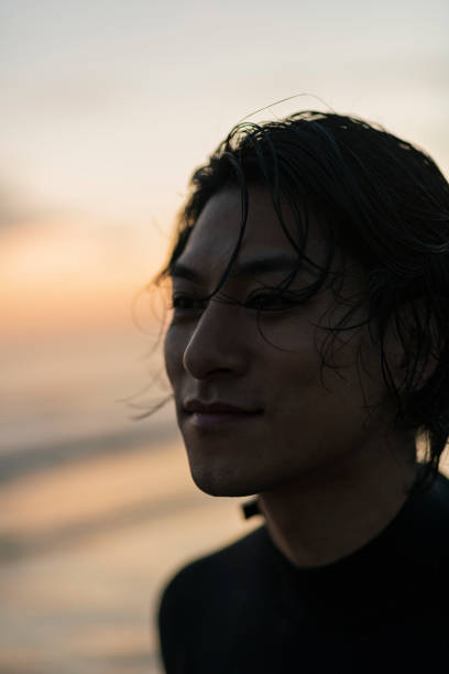 istock Man surfing in the morning ocean. 2159179125
