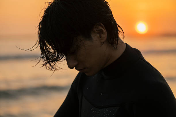 istock Man surfing in the morning ocean. 2159183150