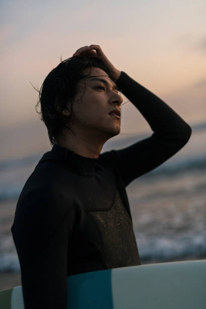 istock Man surfing in the morning ocean. 2159185957