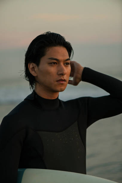 istock Man surfing in the morning ocean. 2159186873