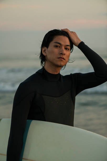 istock Man surfing in the morning ocean. 2159186912