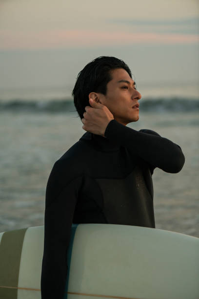 istock Man surfing in the morning ocean. 2159187153