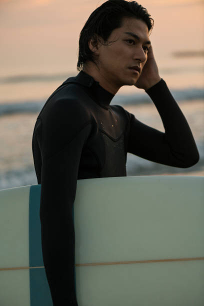 istock Man surfing in the morning ocean. 2159187721