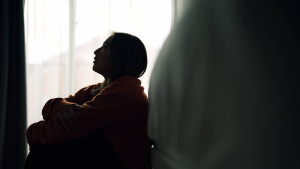istock Woman depression in bedroom. 2159187872