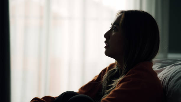 istock Woman depression in bedroom. 2159187902
