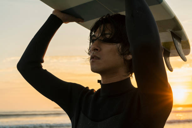 istock Man surfing in the morning ocean. 2159188233