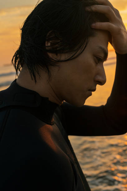 istock Man surfing in the morning ocean. 2159189600