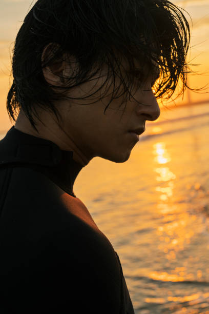 istock Man surfing in the morning ocean. 2159189645