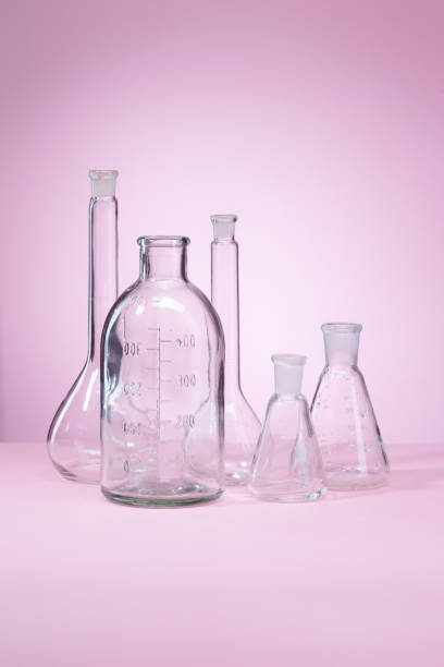 Chemistry Lab. Science And Medical Test Tubes and Flasks On a Pink Background