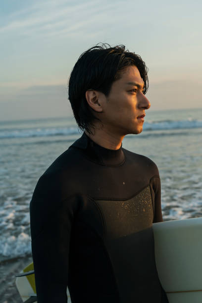 istock Man surfing in the morning ocean. 2159191344